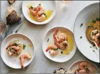  ?? The New York Times/DAVID MALOSH ?? Shrimp Bathed in Olive Oil and Lemon