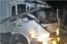  ??  ?? A lorry shattered its windscreen after knocking into a telephone post.