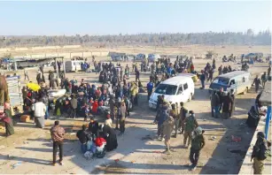  ?? (Ammar Abdullah/Reuters) ?? EVACUEES FROM a rebel-held area of Aleppo arrive yesterday at insurgent-held al-Rashideen, Syria.