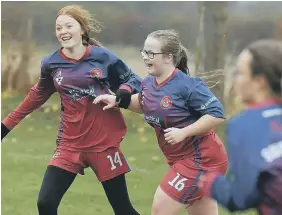  ?? ?? Ellie-Mae Bloomfield, no 16, celebrates her goal with team-mate Sarah Dicks, no 14