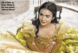  ??  ?? Lily Collins as Snow White in the new movie “Mirror Mirror”