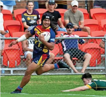  ?? PHOTOS: KEVIN FARMER ?? TRY TIME: Tuia Eluia scores for the Western Mustangs in their under-20s match against the Ipswich Jets at Clive Berghofer Stadium.