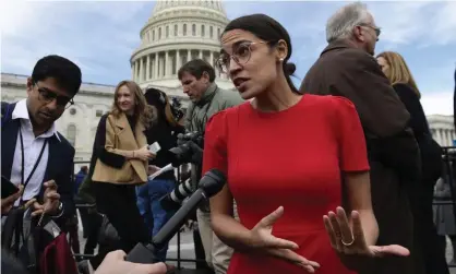  ??  ?? Alexandria Ocasio-Cortez speaks to reporters on Capitol Hill on 14 November. Photograph: Susan Walsh/AP