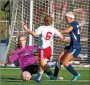  ?? SUBMITTED PHOTO - DENNIS KRUMANOCKE­R ?? Kutztown goalkeeper Olivia Donkus closes down the ball as Fleetwood’s Brianna Harwood tries to get off a shot and Mya Keim defends.