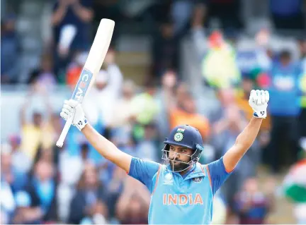  ??  ?? India’s Rohit Sharma celebrates his century in the 2017 ICC Champions Trophy semifinal match between India and Bangladesh on Thursday. (Reuters)