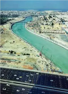  ?? Courtesy: Dubai Media Office ?? A view of the Dubai Canal from Shaikh Zayed Road towards Jumeirah, where it joins the Arabian Gulf.