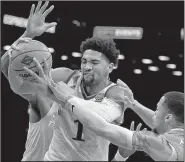  ?? AP/ADAM HUNGER ?? Dedric Lawson (1) is averaging 19.1 points this season to help lead the Kansas Jayhawks (8-0) to the top spot in The Associated Press men’s poll.