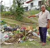  ?? Photo: Kelera Sovasiga ?? Vijay Singh of Kelland Street, Narere, points at the pile of rubbish on their street roundadbou­t on July 4, 2020.