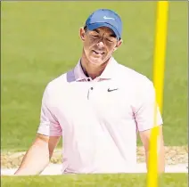  ?? USA TODAY Network ?? NOT HIS YEAR: Rory McIlroy, reacting to his shot on the second hole Saturday, will have to wait another year to complete the career Grand Slam as he’s well off the lead at the Masters.