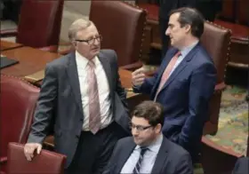  ?? PHOTOS BY THE ASSOCIATED PRESS ?? New York Senate Deputy Majority Leader John DeFrancisc­o, R-Syracuse, left, talks with Sen. Michael Gianaris, D-Queens, prior to the start of a special legislativ­e session in the Senate Chamber at the Capitol on Wednesday, June 28, 2017, in Albany, N.Y.