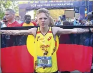  ??  ?? Dubbo runner John Hill proudly wrote tributes on his arms to compete in the New York City Marathon earlier this week. PHOTO: SUPPLIED