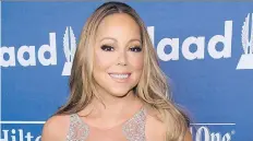  ?? THE ASSOCIATED PRESS/FILES ?? Mariah Carey has moved on, romantical­ly at least, from her highly publicized breakup with James Packer.