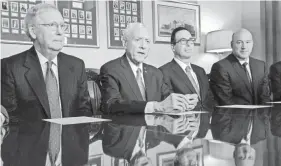  ??  ?? From left, Majority Leader Mitch McConnell, Finance Chairman Orrin Hatch, Treasury Secretary Steven Mnuchin and economic adviser Gary Cohn speak Thursday about the Senate’s version of GOP tax reform. J. SCOTT APPLEWHITE/AP