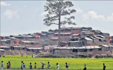  ?? REUTERS ?? Rohingya refugees on their way to a refugee camp in Cox's Bazar, Bangladesh, on Sunday.