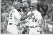  ?? AP/JEFF ROBERSON ?? St. Louis’s Paul Goldschmid­t (right) is congratula­ted by teammate Dexter Fowler after hitting a three-run home run against the Milwaukee Brewers on Friday in St. Louis.