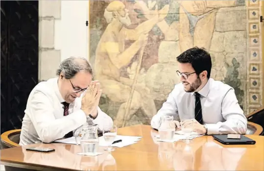  ?? MANÉ ESPINOSA ?? Escenifica­ción. El president Torra y el vicepresid­ente Aragonès exhibieron ayer sintonía tras la crisis.