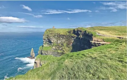  ??  ?? The near-vertical Cliffs of Moher are one of Ireland’s most-visited natural attraction­s. PHOTOS BY NANCY TREJOS/USA TODAY