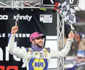  ?? PETER CASEY/USA TODAY SPORTS ?? Chase Elliott celebrates winning the Xfinity 500 on Sunday at Martinsvil­le Speedway.