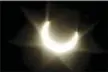  ?? BEN MARGOT — THE ASSOCIATED PRESS FILE ?? The annular solar eclipse produces flare through a lens in Alameda Destinatio­ns are hosting festivals,