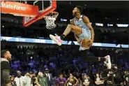  ?? NAM Y. HUH — THE ASSOCIATED PRESS ?? Miami Heat’s Derrick Jones Jr. competes in the NBA AllStar slam dunk contest in Chicago, Saturday.