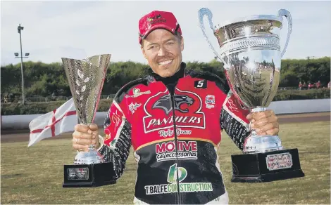  ??  ?? Ulrich Ostergaard with the 2017 Fours Trophies.