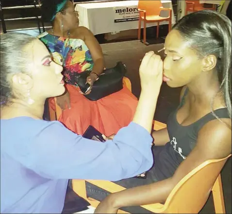  ??  ?? Niketa at Guyana Fashion Week getting a model prepped