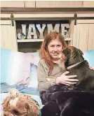  ?? JENNIFER SMITH ?? Jayme Closs smiles with family pets at her aunt’s home two days after escaping from a cabin in Gordon in Douglas County, Wisc.