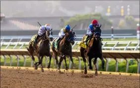  ?? HONS ?? In a photo provided by Benoit Photo, Zedan Racing’s Princess Noor and jockey Victor Espinoza, right, draw away and go on to win the Grade I $250,000Del Mar Debutante horse race, Sunday, Sept. 6, 2020at Del Mar Thoroughbr­ed Club in Del Mar, Calif.