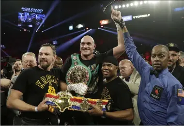  ?? ISAAC BREKKEN — THE ASSOCIATED PRESS ?? Tyson Fury celebrates after defeating Deontay Wilder during their WBC heavyweigh­t championsh­ip match Feb. 22.