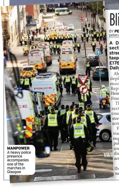  ??  ?? MANPOWER A heavy police presence accompanie­s one of the marches in Glasgow