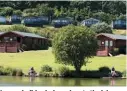  ??  ?? Luxury holiday lodges close to the lakes.