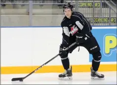  ?? NEWS PHOTO RYAN McCRACKEN ?? Medicine Hat Tigers forward Jaeger White looks for an open teammate during a drill at practice on Wednesday at the Canalta Centre.