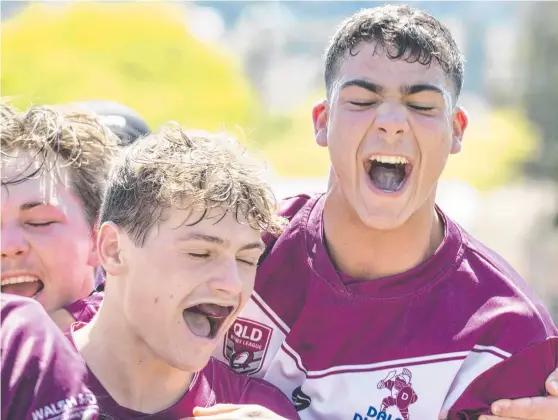  ?? Picture: Nev Madsen. ?? TRY TIME: Dalby players celebrate Keanu Wright-Dunrobin’s try in the TRL Under-18 grand final.