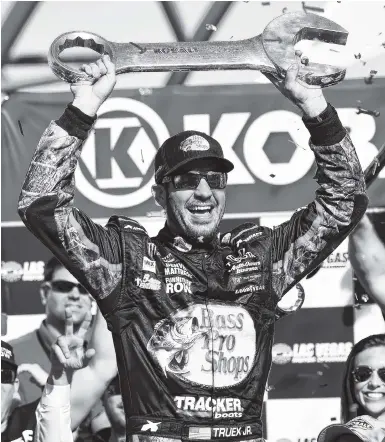  ?? PHOTOS BY THE ASSOCIATED PRESS ?? Martin Truex Jr. celebrates after winning Sunday’s NASCAR Cup Series race at Las Vegas Motor Speedway.