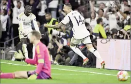  ?? Photo: Anadolu Agency ?? Real Madrid's Joselu Mato (14) celebrates after scoring during the Champions League semi-final second leg match against Bayern Munich