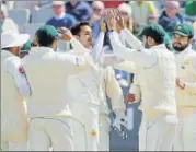  ?? AFP ?? Pakistan’s Mohammad Abbas (C) celebrates with teammates