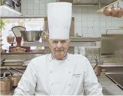  ?? AP FILE PHOTO ?? RENOWNED CHEF: French chef Paul Bocuse poses in his famed Michelin three-star restaurant L’Auberge du Pont de Collonges, in central France, in March 2011. Bocuse has died at 91.