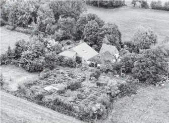  ?? Wilbert Bijzitter / ANP/AFP via Getty Images ?? Dutch police are investigat­ing a case in which six siblings reportedly holed up in their isolated farmhouse for nine years, preparing for doomsday.