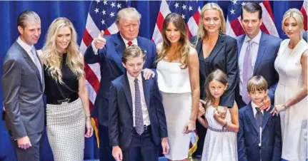  ??  ?? US President-elect Donald Trump, with his family.