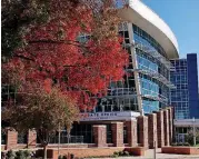  ?? [PHOTO BY DOUG HOKE, THE OKLAHOMAN] ?? The leaves change on trees outside Chesapeake Energy Arena in downtown Oklahoma City.