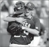  ?? AP/BUTCH DILL ?? Mississipp­i State staff ace Chris Stratton celebrates after coming into the game to record the final out against Vanderbilt in a 3-0 victory in the championsh­ip game of the SEC Tournament on Sunday. The Bulldgos won their first SEC Tournament title...