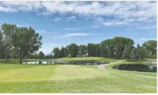  ?? WES GILBERTSON ?? Adam Champion, superinten­dent at Bearspaw Golf Club, on the northwest outskirts of Calgary, is carefully monitoring the turf and water levels in the ponds as a week of scorching weather is forecast.