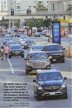  ?? STAFF PHOTOS BY NICOLAUS CZARNECKI ?? GO WITH THE FLOW: The state wants to upgrade the traffic signal technology in the Seaport. Boston’s current system dates to the 1970s.