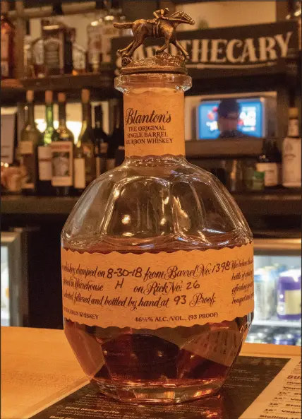  ?? SHUTTERSTO­CK ?? A bottle of Blanton’s Single Barrel Bourbon is shown. Sales of Blanton’s and a sister brand, Weller, are the focus of a multistate investigat­ion into secondary markets and possible counterfei­ting overseas.