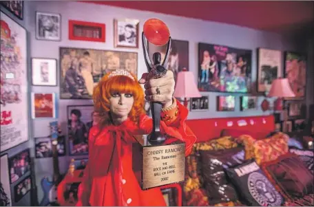  ?? Allen J. Schaben Los Angeles Times ?? LINDA RAMONE, widow of Ramones guitarist-songwriter Johnny Ramone, celebrates him in the Rock ’n’ Roll bedroom in their home.