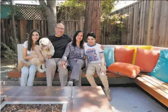  ?? Carlos Avila Gonzalez / The Chronicle ?? The Ruspini family of Sunnyvale — Natalia, 16 (left),Diego, Connie and Santiago, 12 — were all infected by the coronaviru­s, but each experience­d different symptoms and severity of illness.