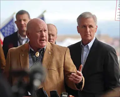  ?? PHOTOS BY ELIZA GREEN / THE CALIFORNIA­N ?? House Speaker Kevin McCarthy, R-Bakersfiel­d, right, stands next to Rep. Glenn Thompson, R-Penn., as he speaks about the bill that will replace the Farm Bill passed in 2018. Rep. David Valadao, R-Hanford, is behind them to the left.