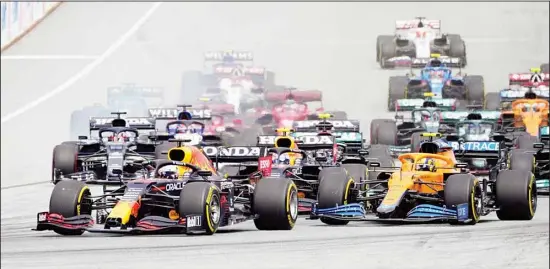  ??  ?? Red Bull driver Max Verstappen of the Netherland­s, (center), steers his car during the start of the Austrian Formula One Grand Prix at the Red Bull Ring racetrack in Spielberg, Austria, on July 4. (AP)