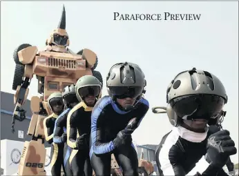  ?? PICTURE: THOBILE MATHONSI ?? Paramount’s Paraforce give a sneak preview of a unique performanc­e next to a Parabot, combining man, machine, urban dance and music, that will be used today as part of the opening day launch at the AAD expo taking place at Waterkloof Air Force Base....