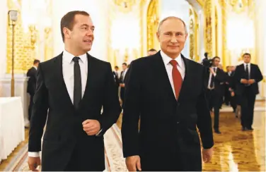  ?? Dmitry Astakhov / Sputnik 2016 ?? Russian Prime Minister Dmitry Medvedev (left) and President Vladimir Putin at the Kremlin last year.